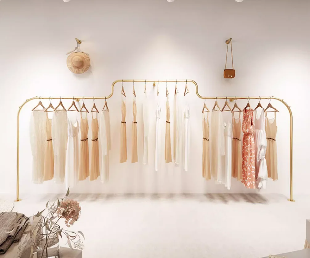 Wall mounted hanging clothes pole on the display rack S2a3a51a33c394d389c9ec42b0cdeda5dy