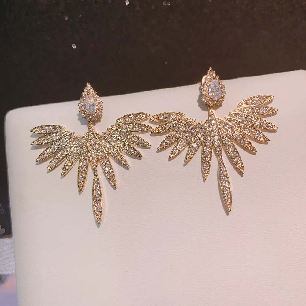 Fashion Luxury Feather Crystal Wing Symmetrical Stud Earrings Exquisite Silver Color Party Jewelry Accessories for Women 5 Mallzona S2ac03a11d2124ce48d83e586e9d20e5fi Fashion Luxury Feather Crystal Wing Symmetrical Stud Earrings Exquisite Silver Color Party Jewelry Accessories for Women Mallzona