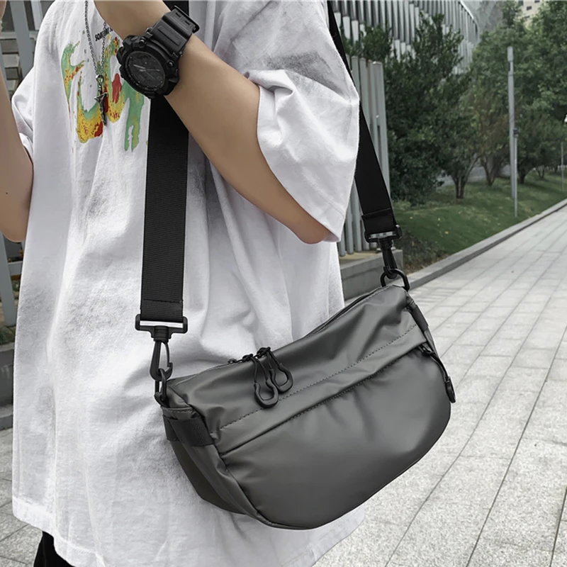 Casual Solid Color men Bags Luxury Designer Shoulder HandBag Nylon Cloth Lady Messenger Mobile Phone Bag Wholesale
Casual Solid Color men Bags Luxury Designer Shoulder HandBag Nylon Cloth Lady Messenger Mobile Phone Bag Wholesale