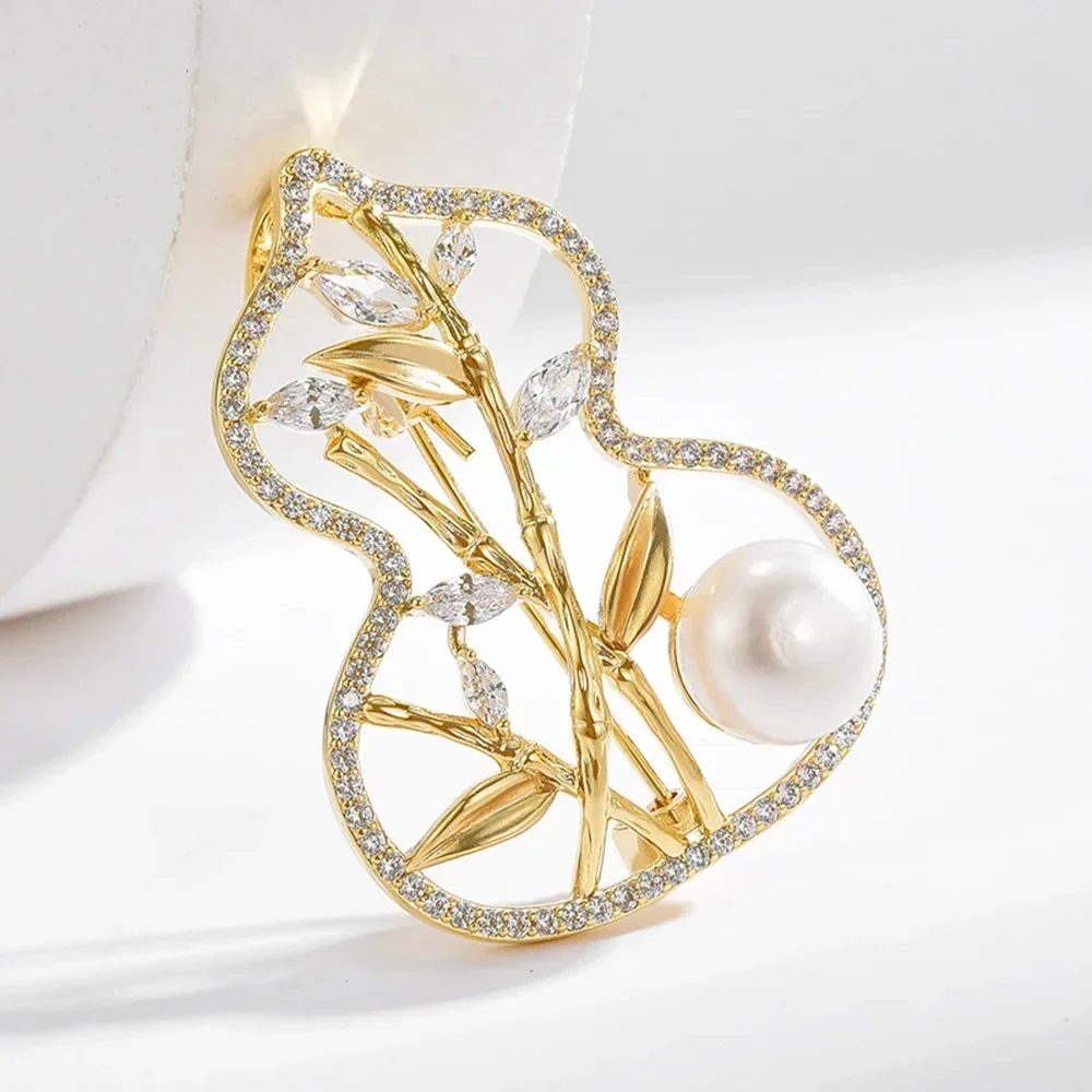 Classic Brooch Bamboo Gourd Brooches Gold Color Hollow Plant Corsage Exquisite Women's Jacket Decoration Accessories Gifts
Classic Brooch Bamboo Gourd Brooches Gold Color Hollow Plant Corsage Exquisite Women's Jacket Decoration Accessories Gifts