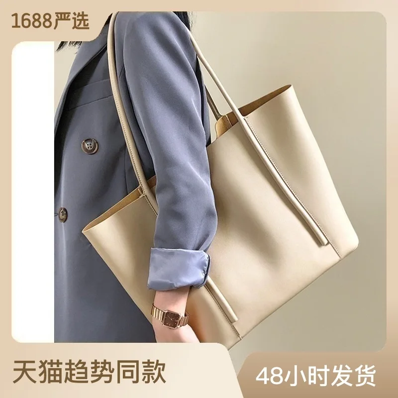 

Niche tote leather women's bag new large capacity portable high-end feeling cowhide commuting shoulder bag