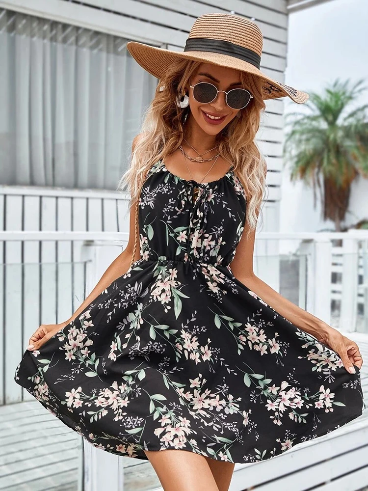 Sexy Women Summer A-Line Floral Dress Hollow Out Design Bandage Decor Sling Sleeveless Backless Elastic Waist Slim Mini Dress 
Sexy Women Summer A-Line Floral Dress Hollow Out Design Bandage Decor Sling Sleeveless Backless Elastic Waist Slim Mini Dress