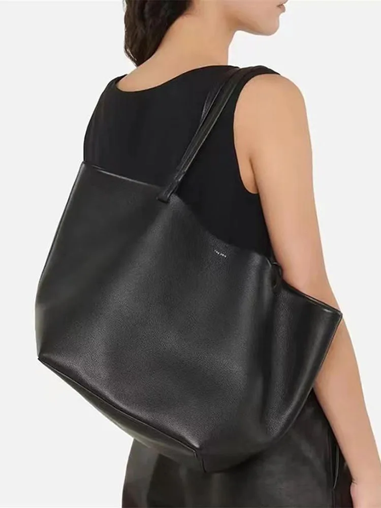 The lychee patterned cowhide tote bag large capacity child mother bag minimalist style commuter portable shoulder bag row
The lychee patterned cowhide tote bag large capacity child mother bag minimalist style commuter portable shoulder bag row