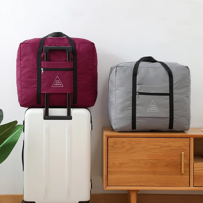 Oxford Hand Luggage Bag Female Large-Capacity Travel Bag Weekend Excursion Storage Bag Shoulder Matching Trolley Suitcase
Oxford Hand Luggage Bag Female Large-Capacity Travel Bag Weekend Excursion Storage Bag Shoulder Matching Trolley Suitcase