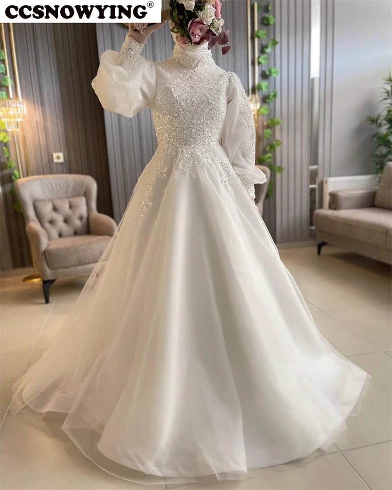 Tulle Appliques Long Sleeve Muslim Hijab Wedding Dresses for Bride High Neck Islamic Bridal Gown Arabic Dubai Robe De Mariée
Tulle Appliques Long Sleeve Muslim Hijab Wedding Dresses for Bride High Neck Islamic Bridal Gown Arabic Dubai Robe De Mariée