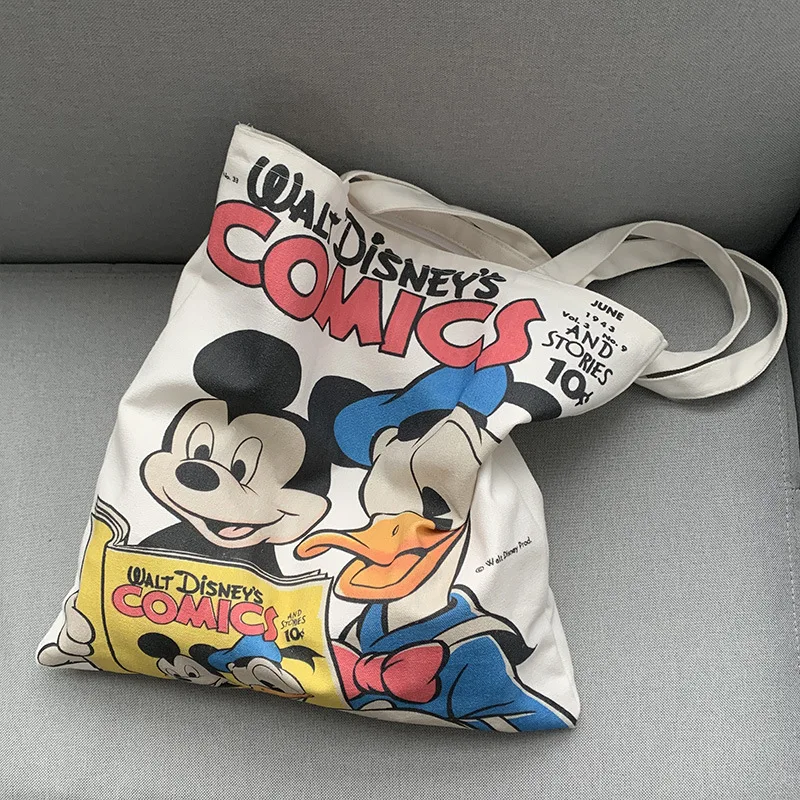 Disney cartoon Minnie Mickey Donald Duck girl shoulder bag handbag canvas large capacity student graffiti school bag
Disney cartoon Minnie Mickey Donald Duck girl shoulder bag handbag canvas large capacity student graffiti school bag