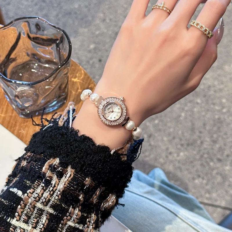 Women'S Watch Fashion Pearl Bracelet Elegant Rhinestone Shell Round Disc Quartz Watch
Women'S Watch Fashion Pearl Bracelet Elegant Rhinestone Shell Round Disc Quartz Watch