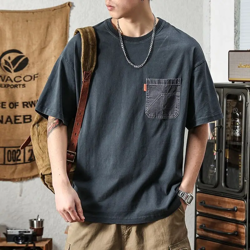 Korean retro short-sleeved T-shirt for men in summer simple pure cotton loose design versatile splicing pocket half-sleeved top
Korean retro short-sleeved T-shirt for men in summer simple pure cotton loose design versatile splicing pocket half-sleeved top