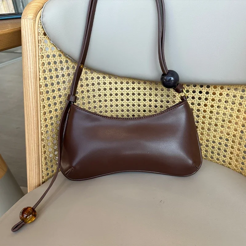 

Women's Cowhide Underarm Bag Simple Pure Colour Handbag Fashion Hundred Crescent Bag Brand Designer With Beaded Small Square Bag