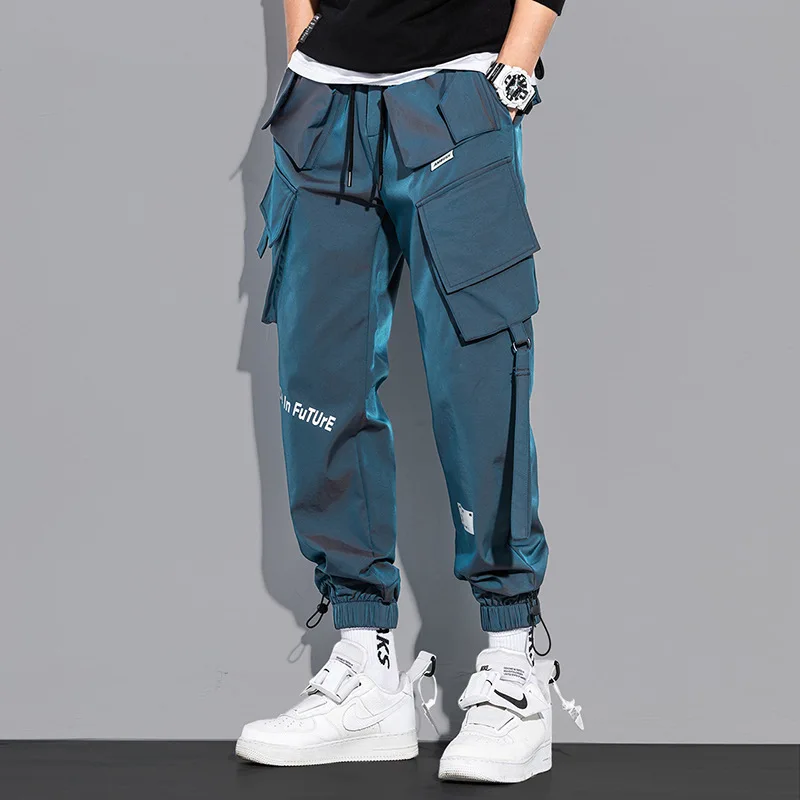 

Модные весенне-осенние Светоотражающие комбинезоны с лазерным рисунком, мужские трендовые Свободные повседневные брюки для мальчиков с широкими лапками и сумочками