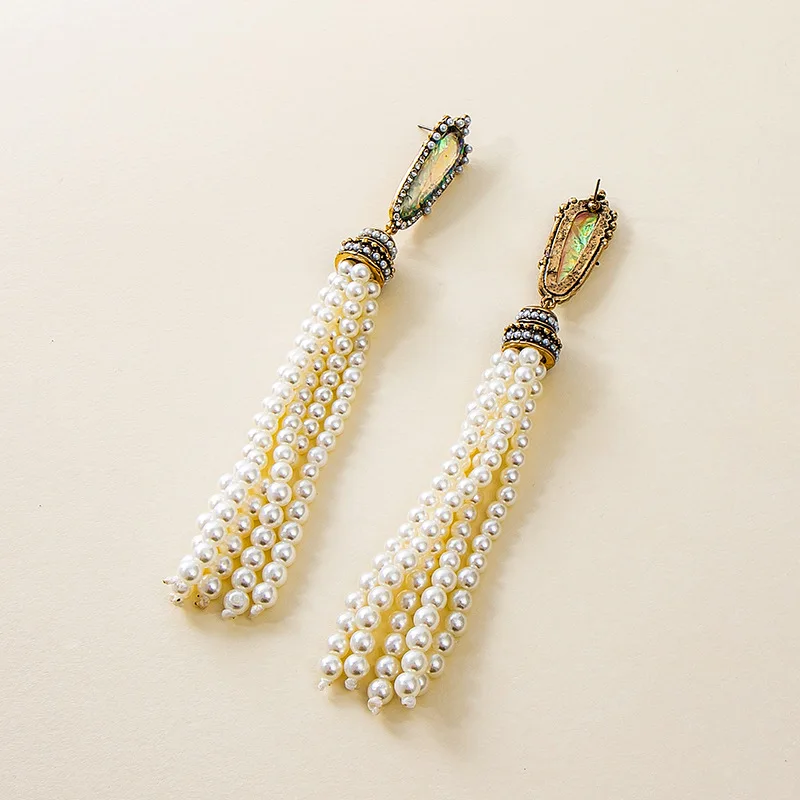 Fashion Antiqued Gold Color Rock White Pearl Beads Chrams AB Stone Pendant Tassel Long Drop Earrings for Women Jewelry
Fashion Antiqued Gold Color Rock White Pearl Beads Chrams AB Stone Pendant Tassel Long Drop Earrings for Women Jewelry