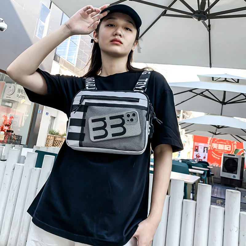 2023 Hip-hop Streetwear Men's Chest Rig Bag High Quality Waterproof Nylon Unisex Chest Packs Multi-function Tactical Vest Male
2023 Hip-hop Streetwear Men's Chest Rig Bag High Quality Waterproof Nylon Unisex Chest Packs Multi-function Tactical Vest Male