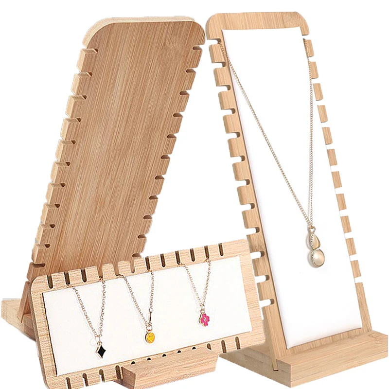 24 Slots Bamboo Necklace Display Stand PU Leather Advanced Shopwindow Storage Panel Wooden Base Jewelry Display Stands Manager
24 Slots Bamboo Necklace Display Stand PU Leather Advanced Shopwindow Storage Panel Wooden Base Jewelry Display Stands Manager