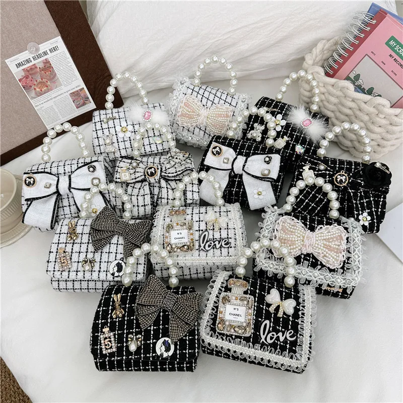 Детские сумочки с бантом и жемчугом, роскошные аксессуары для платья принцессы, маленький кошелек для монет, сумка-тоут для девочек, сумки через плечо с цепочкой
Детские сумочки с бантом и жемчугом, роскошные аксессуары для платья принцессы, маленький кошелек для монет, сумка-тоут для девочек, сумки через плечо с цепочкой