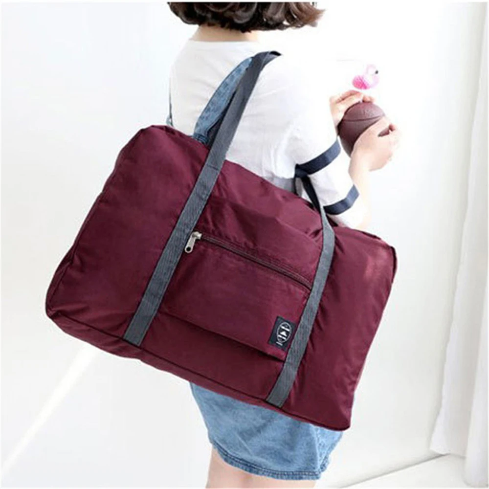 Nylon Foldable Travel Bags Unisex Large Capacity Bag Luggage Women WaterProof Handbags Men Travel Bags Clothing Organizer
Nylon Foldable Travel Bags Unisex Large Capacity Bag Luggage Women WaterProof Handbags Men Travel Bags Clothing Organizer