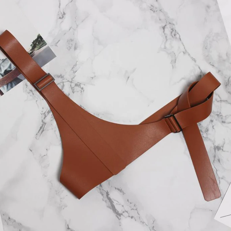 2023 New Spring PU Leather Corset Vest Strap Belt Brief Irregular Steampunk Harness Strechy Waistcoat Wide Girdle Women Fashion
2023 New Spring PU Leather Corset Vest Strap Belt Brief Irregular Steampunk Harness Strechy Waistcoat Wide Girdle Women Fashion