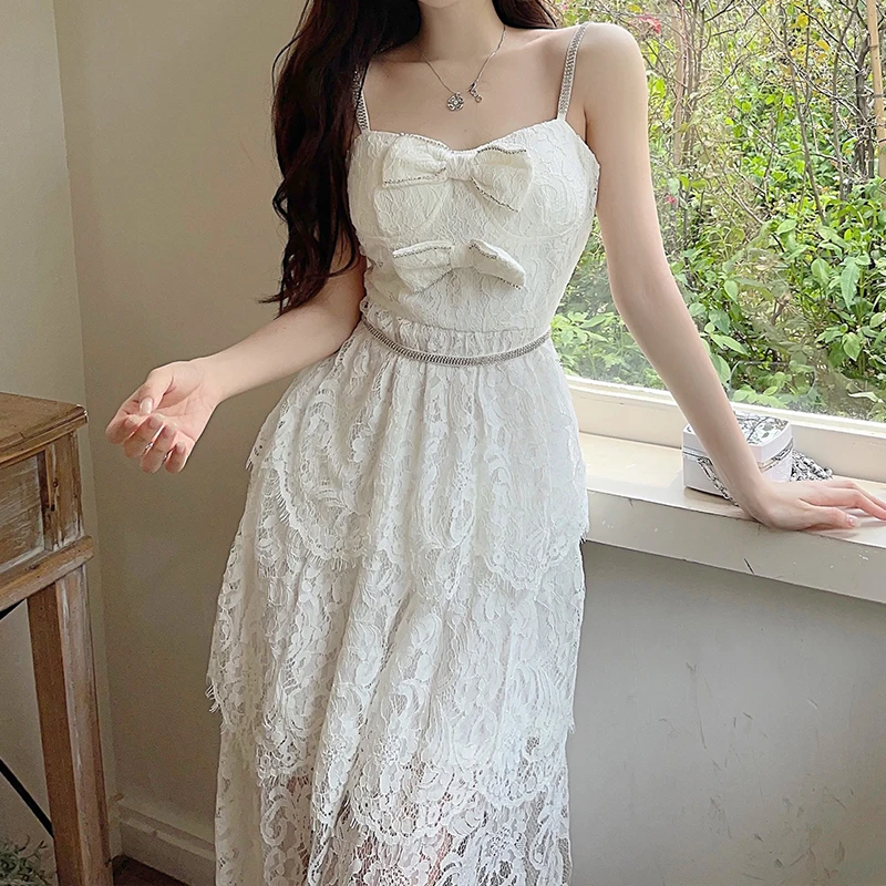 2023 New White Women Dress Bow Spaghetti Strapped Elegant Party Vestido Mujer Hollow Out Vintage Lace Dresses Bodycon Luxury 
2023 New White Women Dress Bow Spaghetti Strapped Elegant Party Vestido Mujer Hollow Out Vintage Lace Dresses Bodycon Luxury