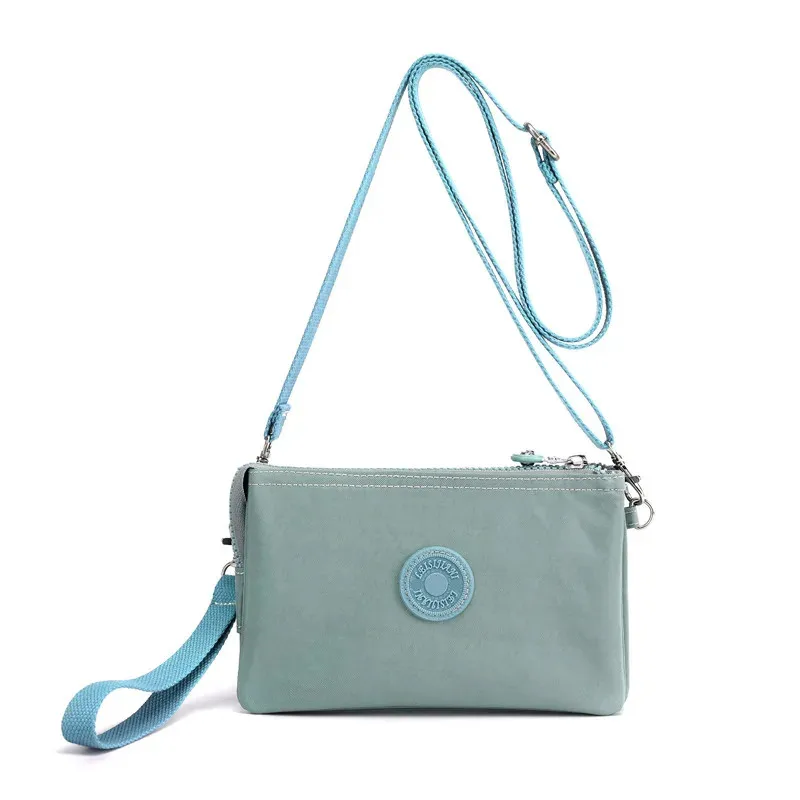 Ручная женская сумка из нейлоновой ткани, модель 2024 года, летняя новая сумка через плечо, Повседневная многослойная сумка-кошелек
Ручная женская сумка из нейлоновой ткани, модель 2024 года, летняя новая сумка через плечо, Повседневная многослойная сумка-кошелек