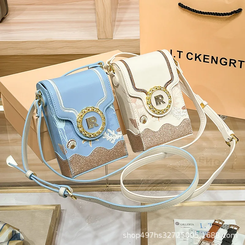 Luxury Brand Fashion Light Luxury Star Ocean Classic Mobile Phone Bag Trendy and Unique One Shoulder Crossbody Women's Bag
Luxury Brand Fashion Light Luxury Star Ocean Classic Mobile Phone Bag Trendy and Unique One Shoulder Crossbody Women's Bag