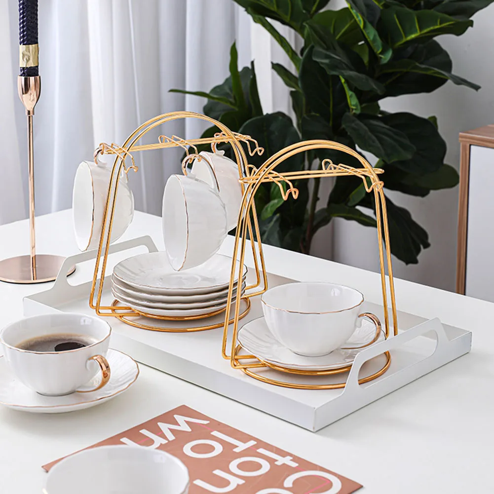 Golden Tea Cup And Saucer Display Rack Iron Water Drainer Mug Hanger Coffee Cup Hanger For Both Household And Restaurant Kitchen
Golden Tea Cup And Saucer Display Rack Iron Water Drainer Mug Hanger Coffee Cup Hanger For Both Household And Restaurant Kitchen
