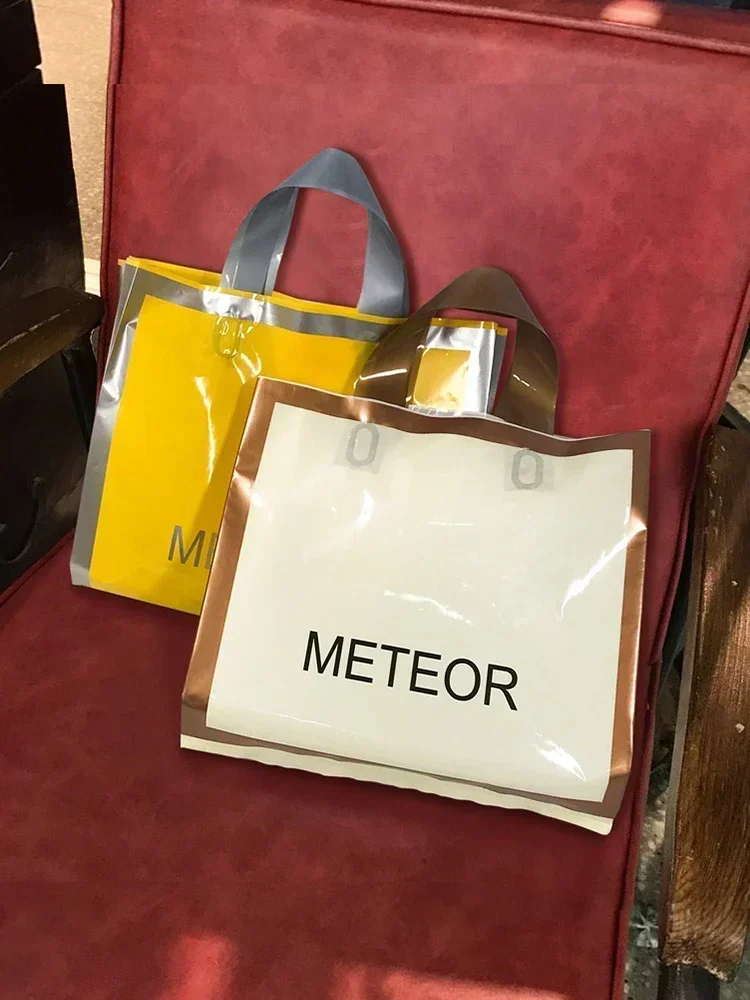 50 Pcs Clothing Handbag High Grade Folding Plastic Gift Packaging Bag Horizontal Thickened Durable Shopping Bags Custom Logo
50 Pcs Clothing Handbag High Grade Folding Plastic Gift Packaging Bag Horizontal Thickened Durable Shopping Bags Custom Logo
