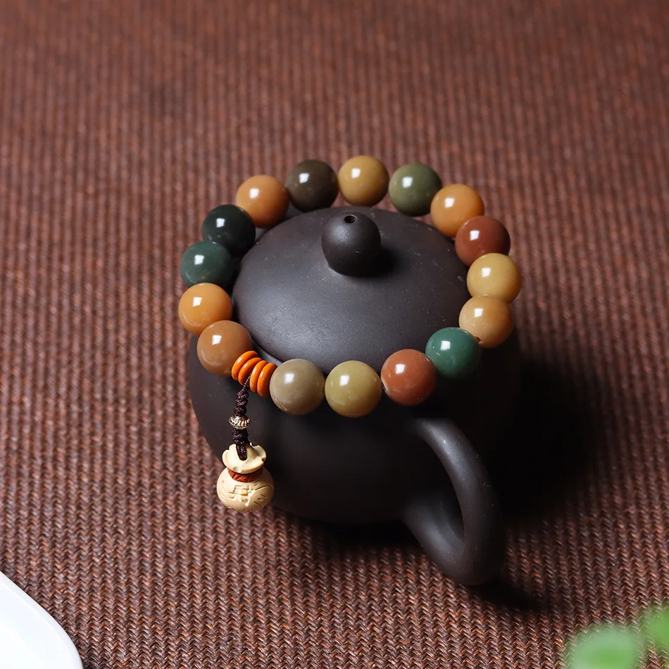 

Carbon Baked Candy Color Ball Bodhi Root Colorful Multi Treasure Weathered Bodhi High Throwing Finger Blessing Bag Handstring