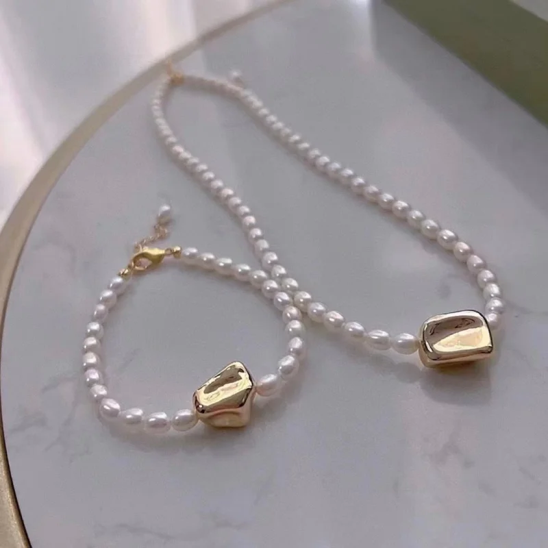 Irregular Gold Particle Natural Millet Pearl Bracelet and Necklace Set 7mm M Clavicle Chain
Irregular Gold Particle Natural Millet Pearl Bracelet and Necklace Set 7mm M Clavicle Chain