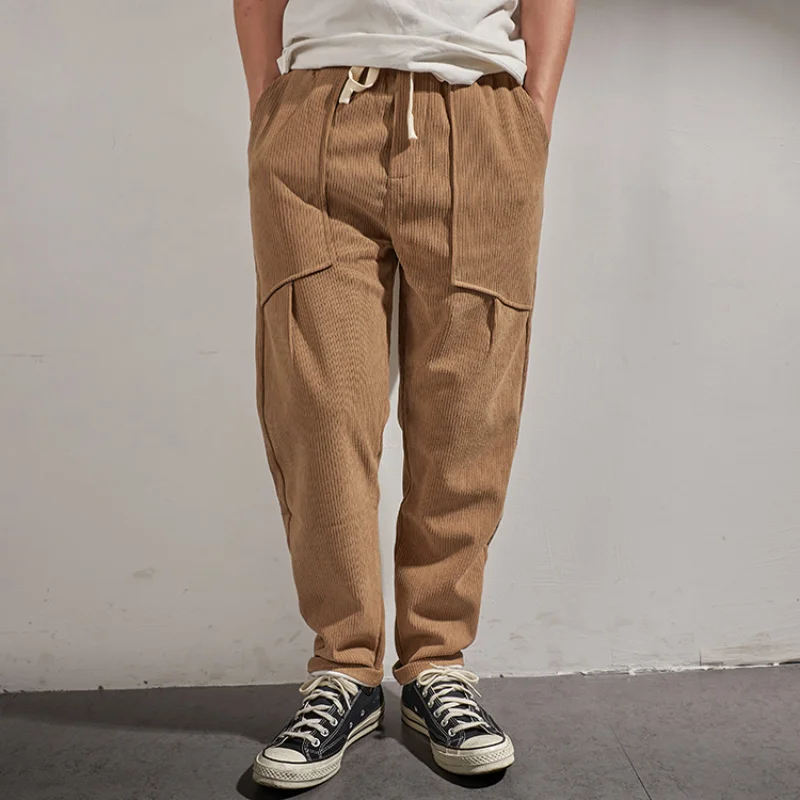 American retro corduroy pants Japanese in autumn men's loose corduroy trend tooling casual tapered long pants.
American retro corduroy pants Japanese in autumn men's loose corduroy trend tooling casual tapered long pants.