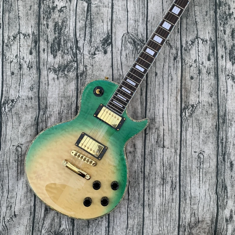 

In stock LP electric guitar with 6-string integrated design green body and quilted maple veneer high gloss rose wood fingerboard