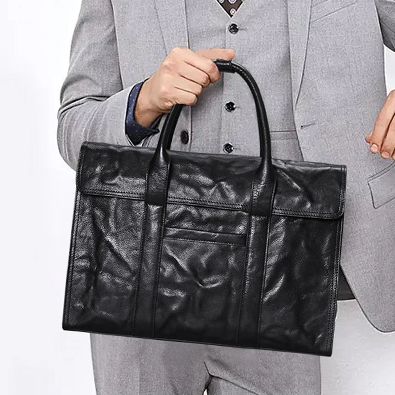 

AETOO New commuter casual men's handbag hand grasp leather men's baotou layer cowhide large capacity men's briefcase bag