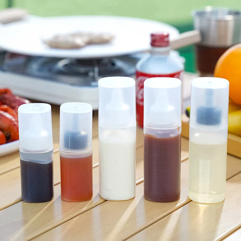 Portable Mini Seasoning Bottle Outdoor Salad Dressing Bottle Plastic Picnic Squeeze Sauce Bottle with Dust Cover Kitchen Tools
Portable Mini Seasoning Bottle Outdoor Salad Dressing Bottle Plastic Picnic Squeeze Sauce Bottle with Dust Cover Kitchen Tools