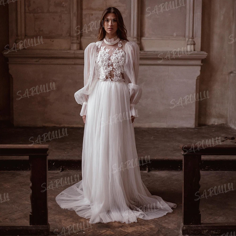 3D Flowers Tulle Wedding Dress Long Puff Sleeves Pleated Backless Embroidery Illusion Maxi Full Length High Collar Bridal Gown
3D Flowers Tulle Wedding Dress Long Puff Sleeves Pleated Backless Embroidery Illusion Maxi Full Length High Collar Bridal Gown