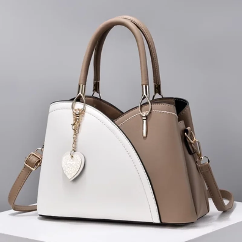 Temperament autumn and winter new Korean style versatile handbag large bag fashionable simple shoulder crossbody bag
Temperament autumn and winter new Korean style versatile handbag large bag fashionable simple shoulder crossbody bag