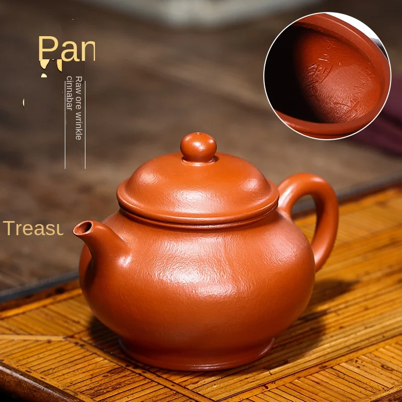 Hand-made Pan-pot teapot with wrinkled skin and vermicelli from Yixing sea teapot.
Hand-made Pan-pot teapot with wrinkled skin and vermicelli from Yixing sea teapot.