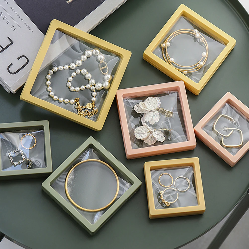 PE Film Jewelry Storage Box Rings Earrings Necklace Display Holder 3D Floating Frame Dustproof Packaging Case Organizer
PE Film Jewelry Storage Box Rings Earrings Necklace Display Holder 3D Floating Frame Dustproof Packaging Case Organizer