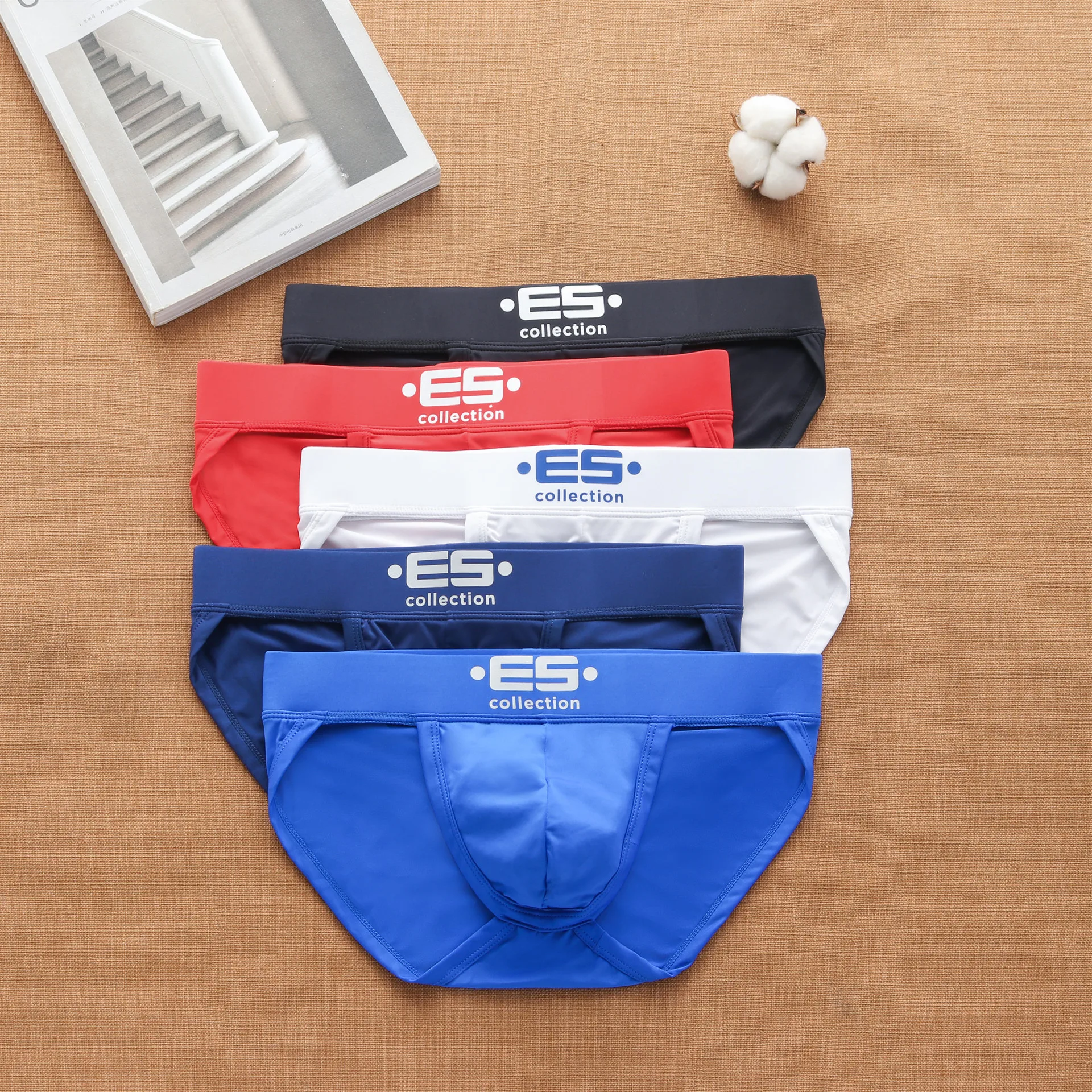 ES milk silk super slippery stretch low rise thin high fork men's briefs letter fashion trendy men's panties 
ES milk silk super slippery stretch low rise thin high fork men's briefs letter fashion trendy men's panties