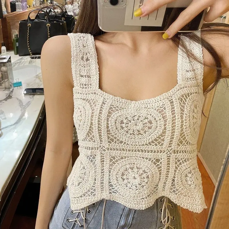 New summer retro embroidered sling women's knitted hollow thick shoulder straps wear jacket
New summer retro embroidered sling women's knitted hollow thick shoulder straps wear jacket