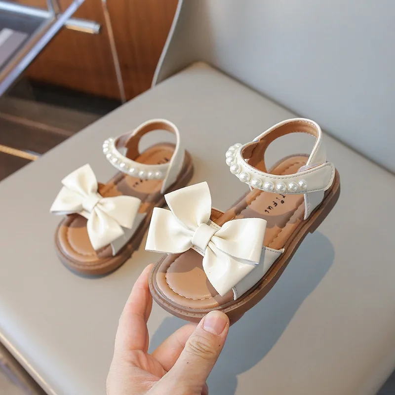 

Baby Girl Sandals 2024 Summer New Korean Fashion Bowknot Pearl Soft Sole Shoes Kids Girls Princess Shoes Childrens Beach Shoes