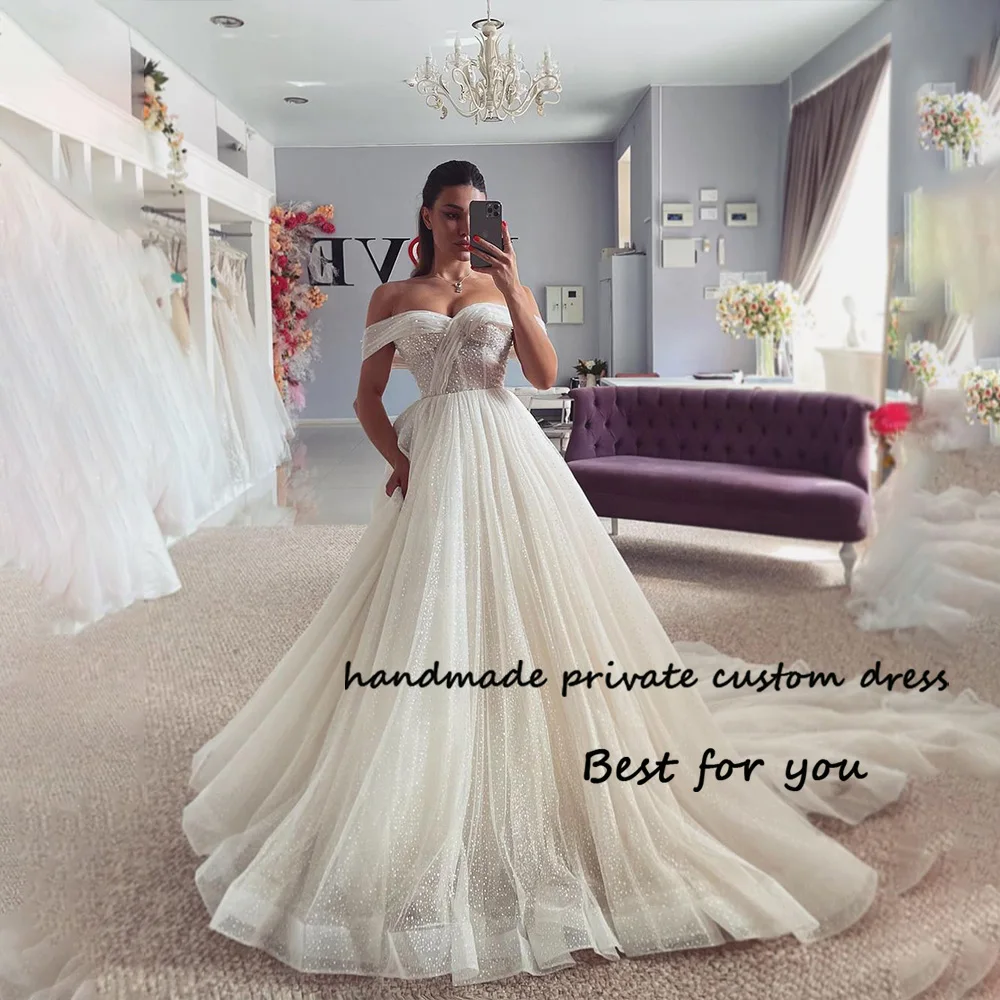 Luxury Princess Wedding Dresses for Bridal Off Shoulder Sparkly Tulle Long A Line Bridal Gown with Train
Luxury Princess Wedding Dresses for Bridal Off Shoulder Sparkly Tulle Long A Line Bridal Gown with Train