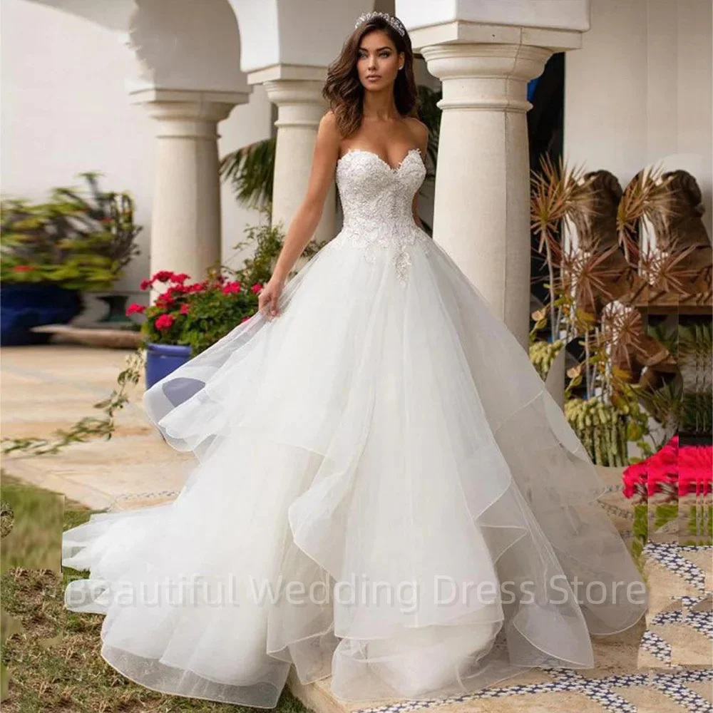 

Luxury Princess Wedding Dress Sequined Beading Bodice Sweetheart Lace Appliques Puffy Organza Bridal Gown Robe De Mariee