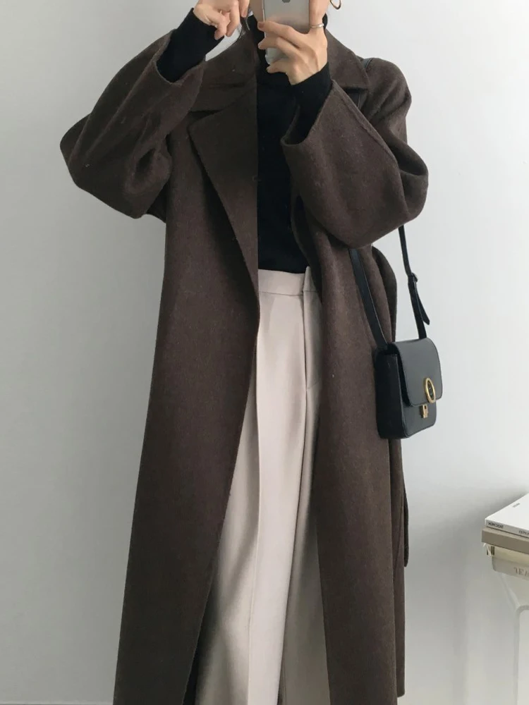 Faux Woolen Coat Women French Style Elegant Lapel Long Jackets Female Autumn Winter Warm Casual Loose Lace Up Cardigan Outerwear
Faux Woolen Coat Women French Style Elegant Lapel Long Jackets Female Autumn Winter Warm Casual Loose Lace Up Cardigan Outerwear