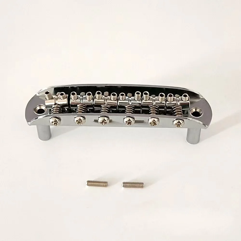 Classic Chrome Vintage Mustang Bridge W/Large Saddles, 7.25" Radius Guitar Parts Accessories
Classic Chrome Vintage Mustang Bridge W/Large Saddles, 7.25" Radius Guitar Parts Accessories