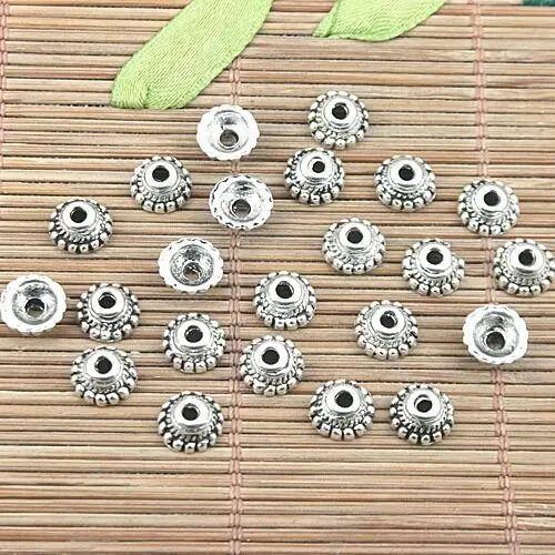 50pcs wide:7.5mm,height:3mm,loop:1.7mm tibetan silver color bead caps for DIY jewery making H1126
50pcs wide:7.5mm,height:3mm,loop:1.7mm tibetan silver color bead caps for DIY jewery making H1126