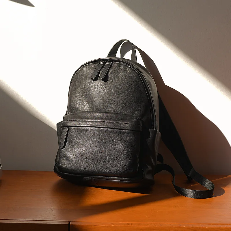 Solid color men's and women's backpacks, genuine leather, large capacity, multifunctional student backpack, travel backpack
Solid color men's and women's backpacks, genuine leather, large capacity, multifunctional student backpack, travel backpack