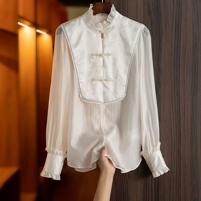 Retro Pearl Beading Buckle Shirt Women's Spring Autumn New Chinese Style Printed Splicing Top Female Elegant Tops Casual Blouse
Retro Pearl Beading Buckle Shirt Women's Spring Autumn New Chinese Style Printed Splicing Top Female Elegant Tops Casual Blouse