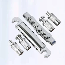 6pcs Guitar Bridge 6 String Locking Bridge and Tailpiece Set for LP Electric Guitar (Silver)
6pcs Guitar Bridge 6 String Locking Bridge and Tailpiece Set for LP Electric Guitar (Silver)