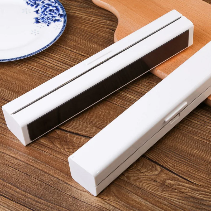 Простой креативный кухонный прибор, нижний магнит, прибор для резки адсорбционной липкой пленки, контейнер для хранения пищевой пленки
Простой креативный кухонный прибор, нижний магнит, прибор для резки адсорбционной липкой пленки, контейнер для хранения пищевой пленки