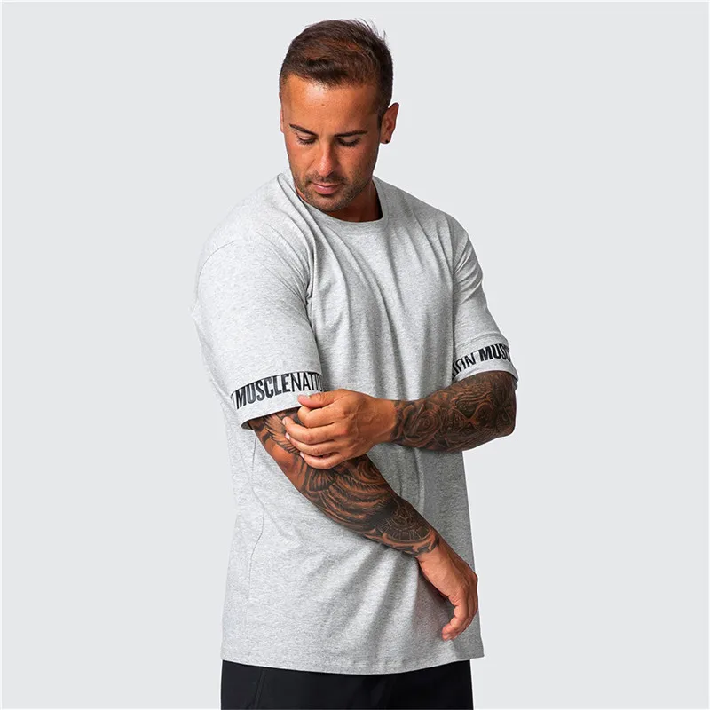 

Men's t-shirt Gym Men Oversized T Shirt Outdoor Fitness Hip Hop Streetwear Loose short-sleeved Bodybuilding top Overlay cuffs