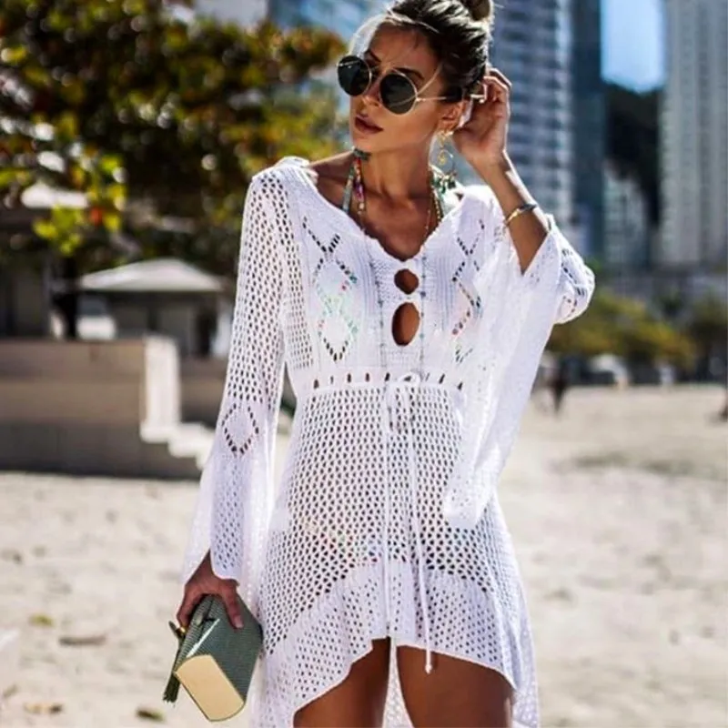 

2023 Spring Summer Hollow-out Sunscreen Shirt Flared Sleeve Beach Blouse Bikini Blouse European Beauty Sweater