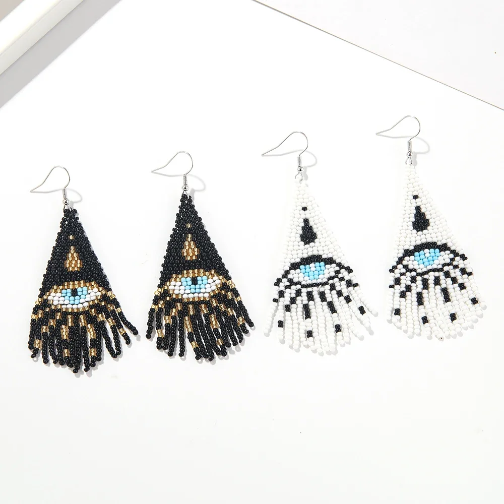 

Rice bead earrings Hand woven fashion Devil's Eye Beading Simplicity Bohemia originality alloy ma'am Fringed earrings